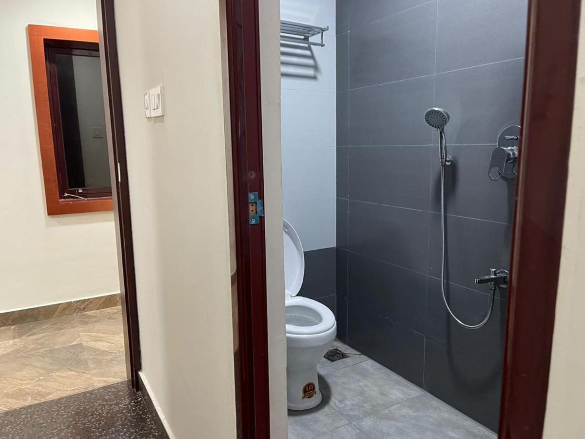 Hotel Bassac Residency à Changanācheri Extérieur photo