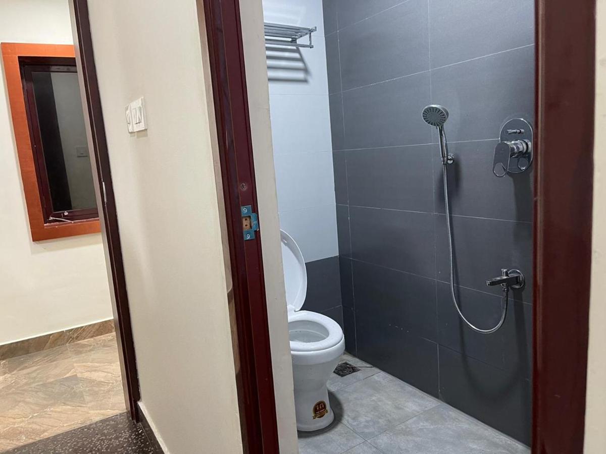 Hotel Bassac Residency à Changanācheri Extérieur photo