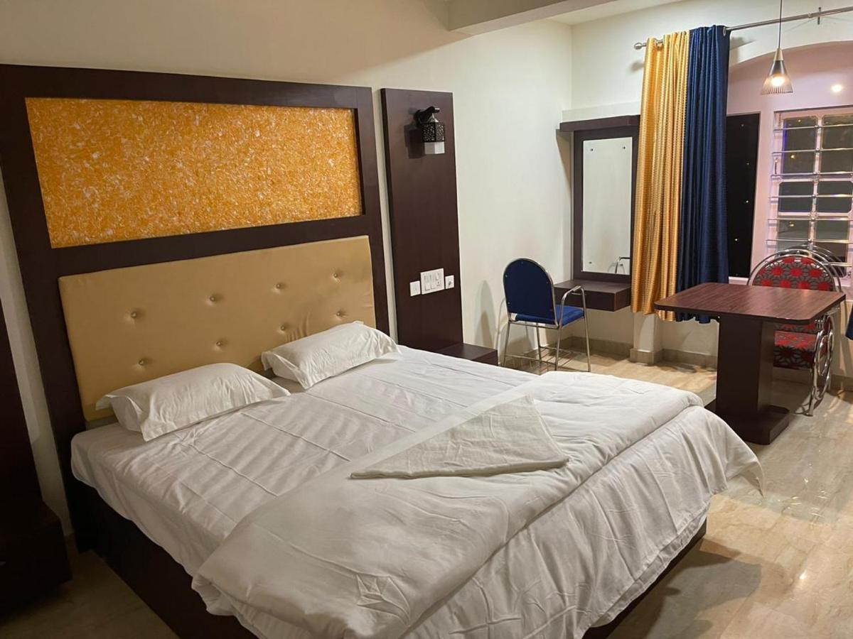 Hotel Bassac Residency à Changanācheri Extérieur photo