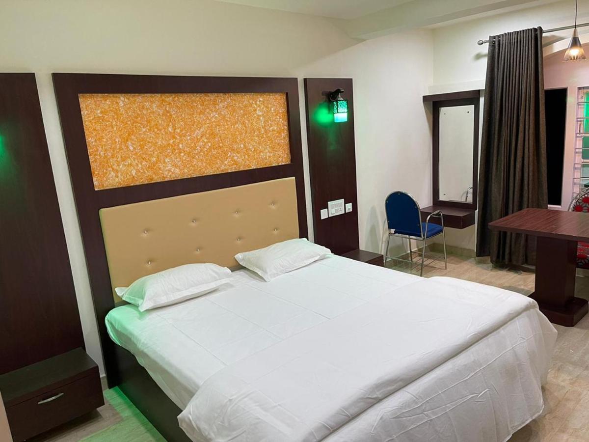 Hotel Bassac Residency à Changanācheri Extérieur photo